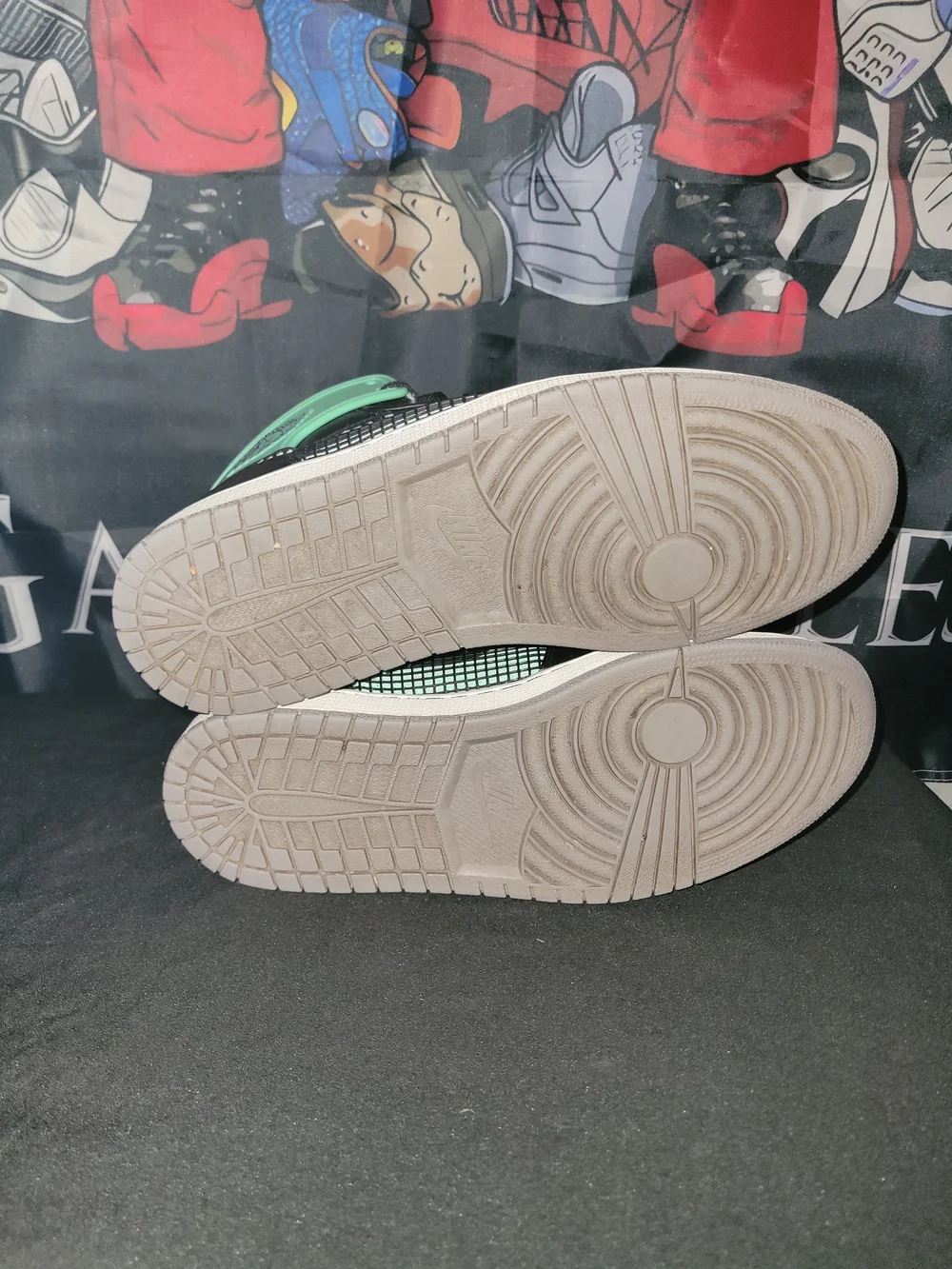 Jordan 1 Retro Black and Mint Green Glow Hi-Top Sneakers